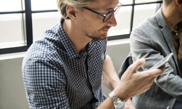 Man using his smartphone to connect to the internet